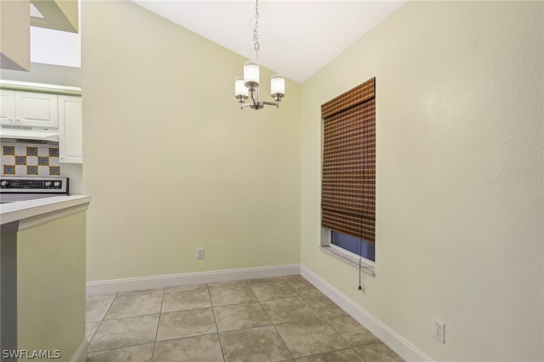 18364 Camellia Road Fort Myers, FL 33967 - Photo 13 of 48 a view of a hallway with workspace