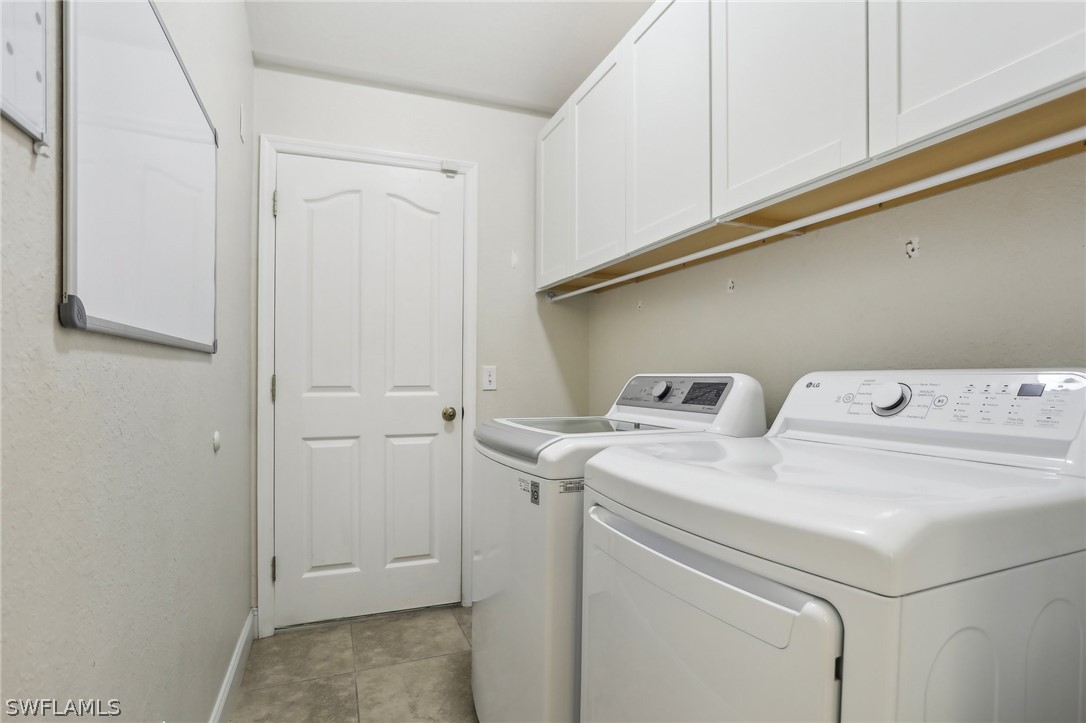 18364 Camellia Road Fort Myers, FL 33967 - Photo 31 of 48 a utility room with dryer and washer