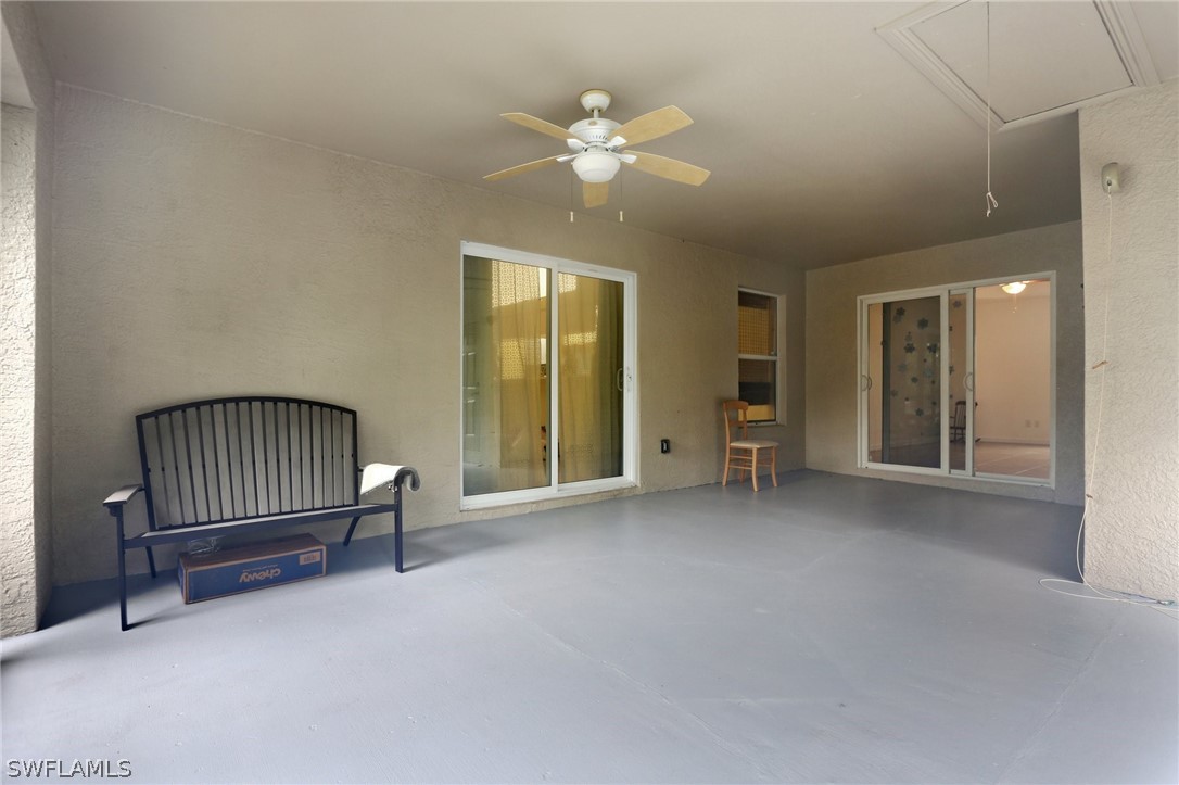 18364 Camellia Road Fort Myers, FL 33967 - Photo 38 of 48 a view of a livingroom with a ceiling fan and window