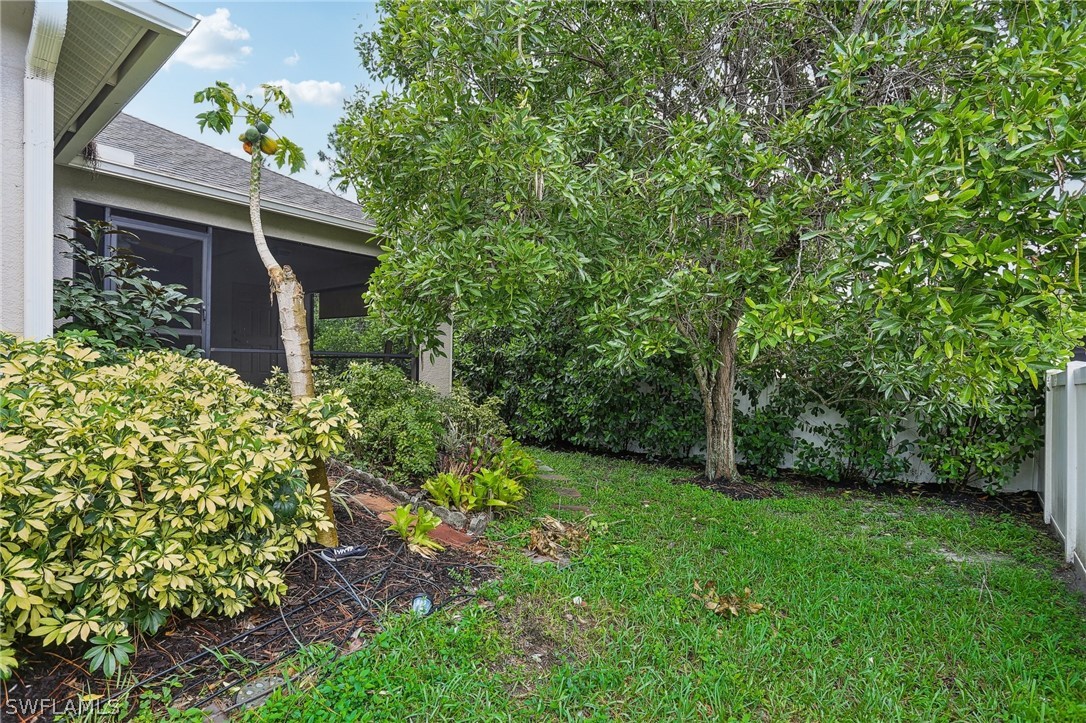 18364 Camellia Road Fort Myers, FL 33967 - Photo 42 of 48 a view of a house with a yard