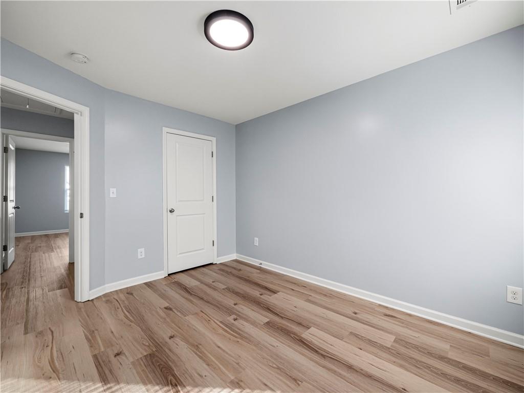 4334 Box Elder Path Gainesville, GA 30504 - Photo 20 of 39 wooden floor in an empty room