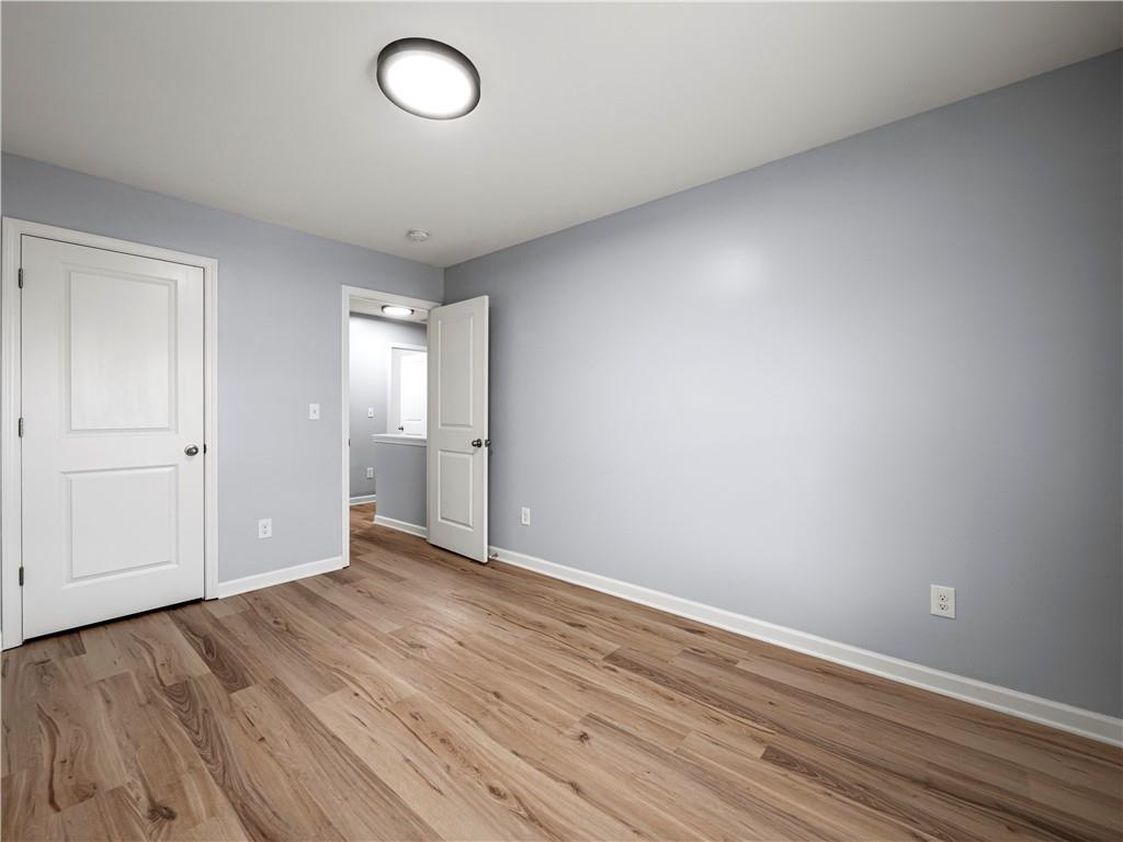 4334 Box Elder Path Gainesville, GA 30504 - Photo 23 of 39 wooden floor in an empty room