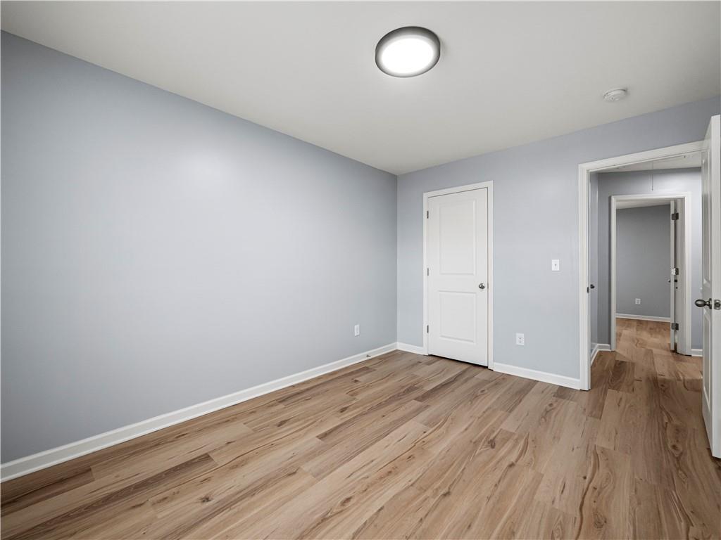 4334 Box Elder Path Gainesville, GA 30504 - Photo 24 of 39 a view of a room with wooden floor