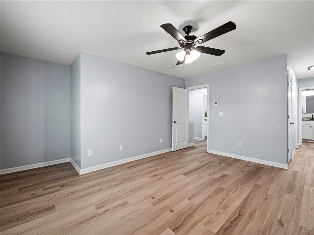 4334 Box Elder Path Gainesville, GA 30504 - Photo 31 of 39 a view of an empty room with wooden floor