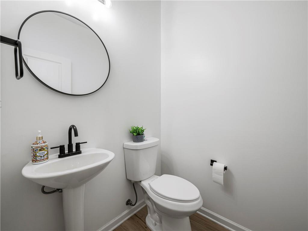 4334 Box Elder Path Gainesville, GA 30504 - Photo 34 of 39 a bathroom with a sink and a mirror