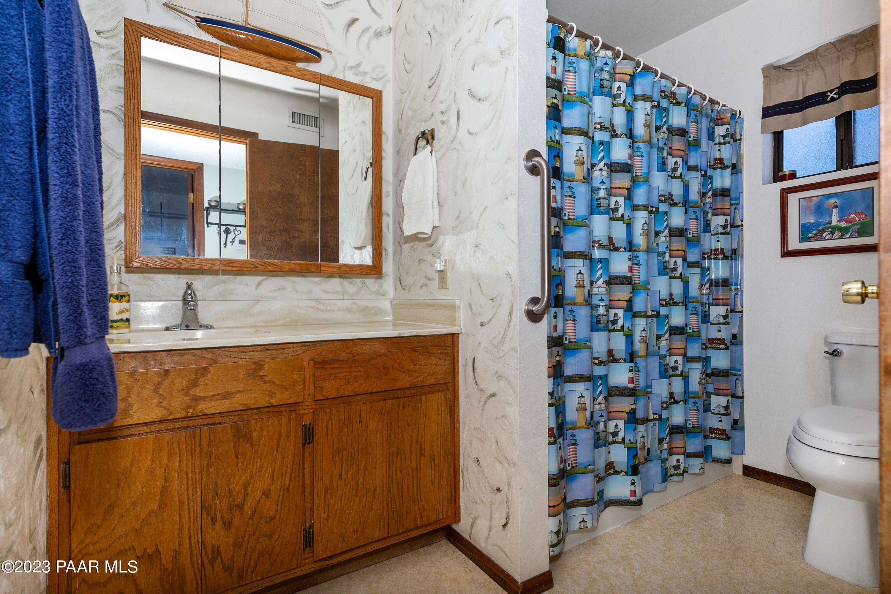 2680 Ridge Road Prescott, AZ 86301 - Photo 15 of 25 a bathroom with a sink and a mirror