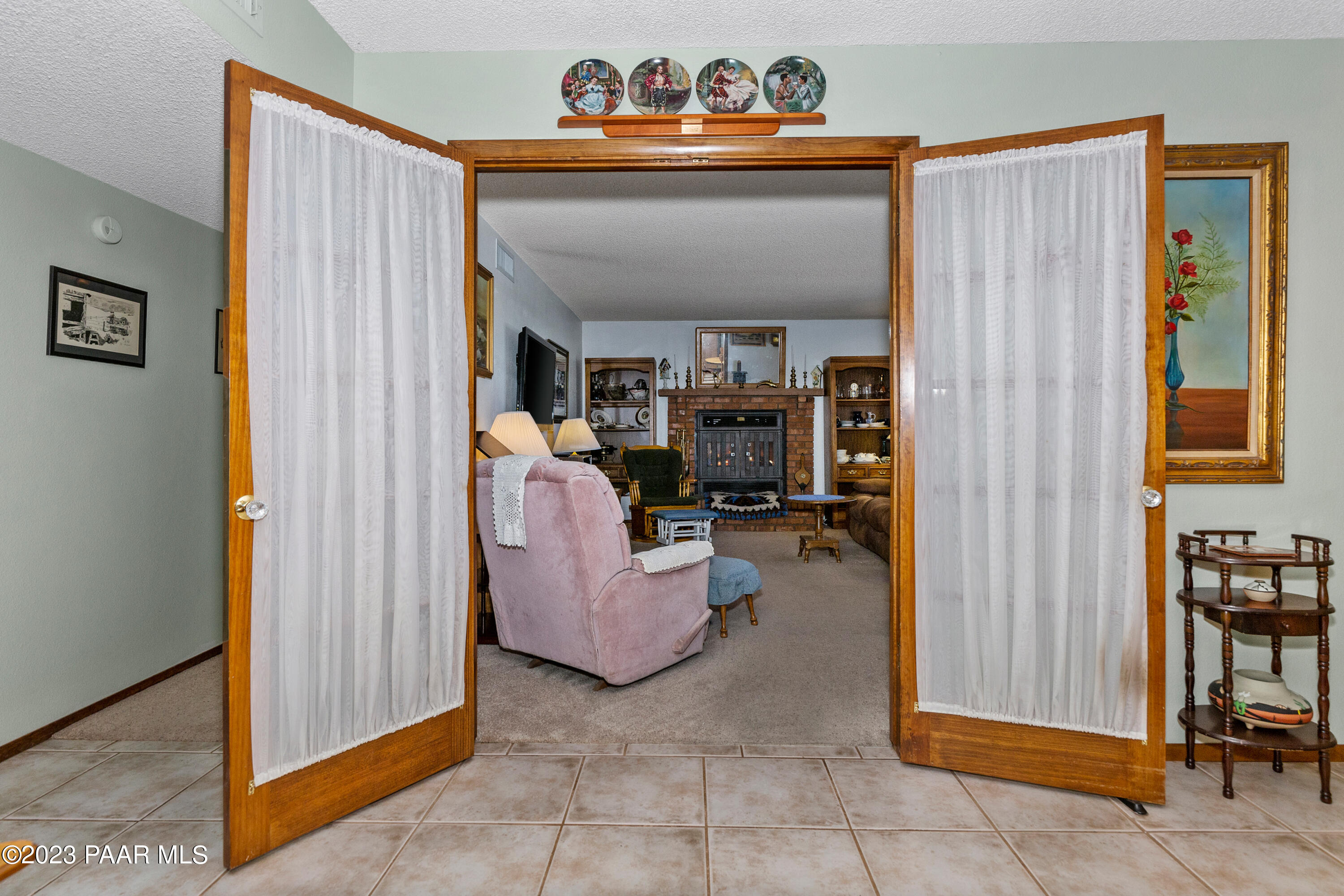 2680 Ridge Road Prescott, AZ 86301 - Photo 4 of 25 a living room with furniture and a flat screen tv