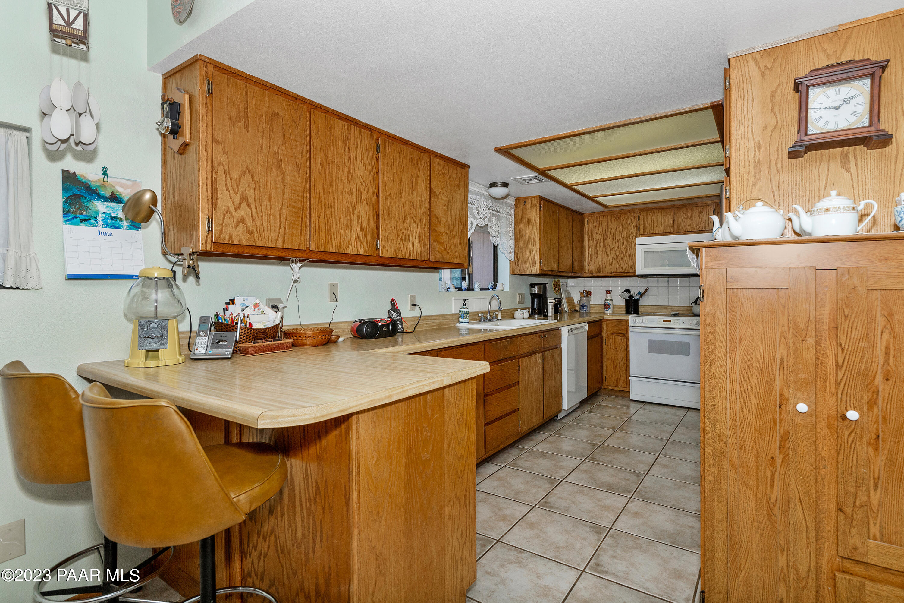 2680 Ridge Road Prescott, AZ 86301 - Photo 6 of 25 a kitchen with a sink cabinets and appliances