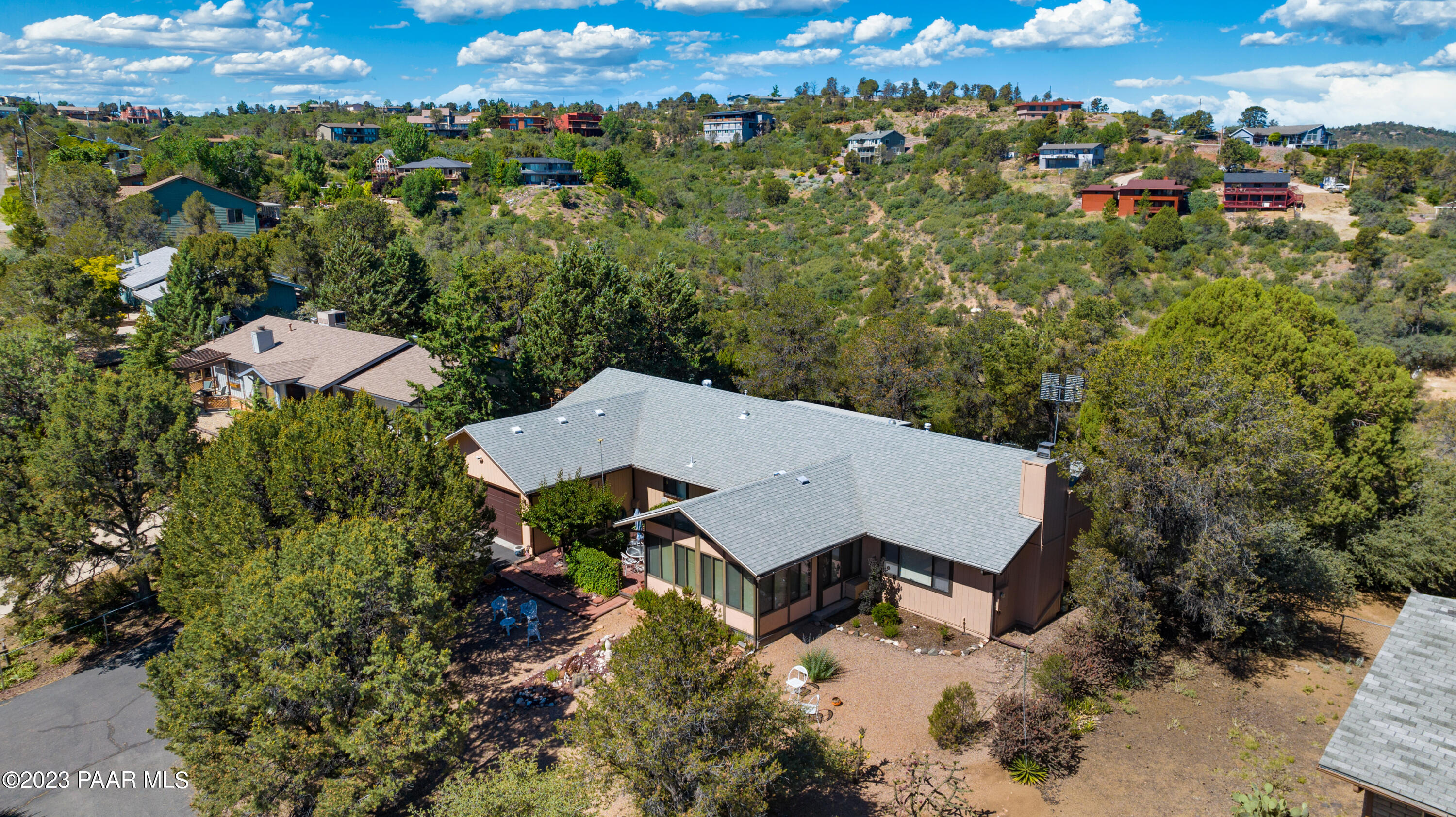 2680 Ridge Road Prescott, AZ 86301 - Photo 10 of 25 an aerial view of a house with a yard and mountain