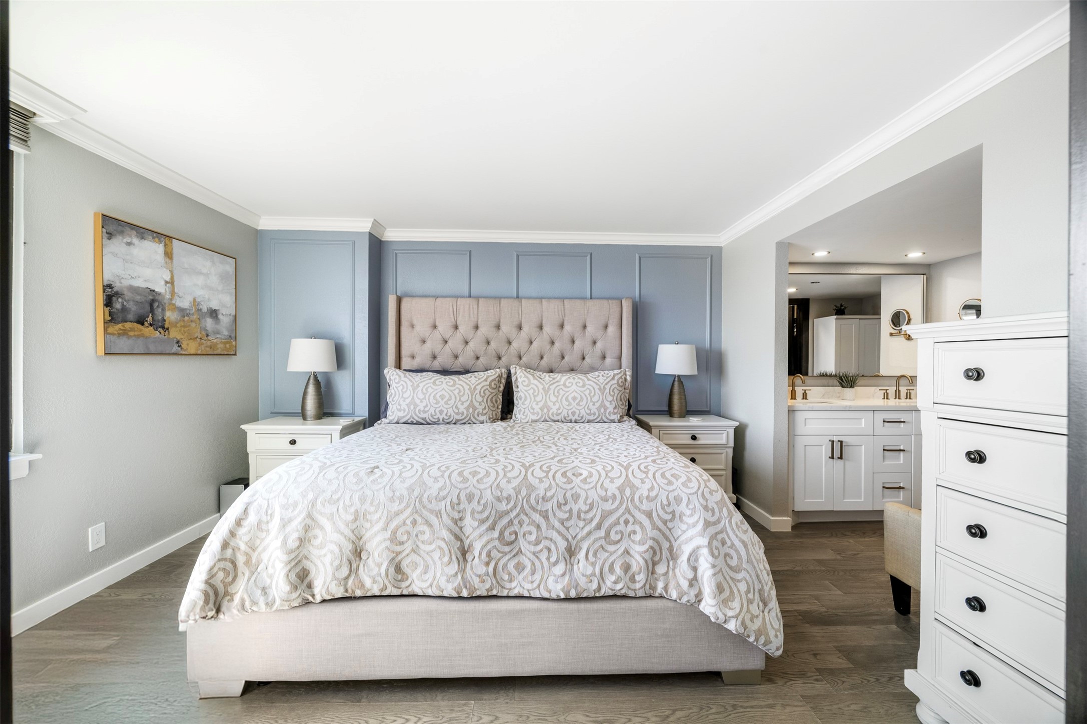 3525 Sage Road, Unit 1403 Houston, TX 77056 - Photo 19 of 47 a large bed sitting in a bedroom and dresser