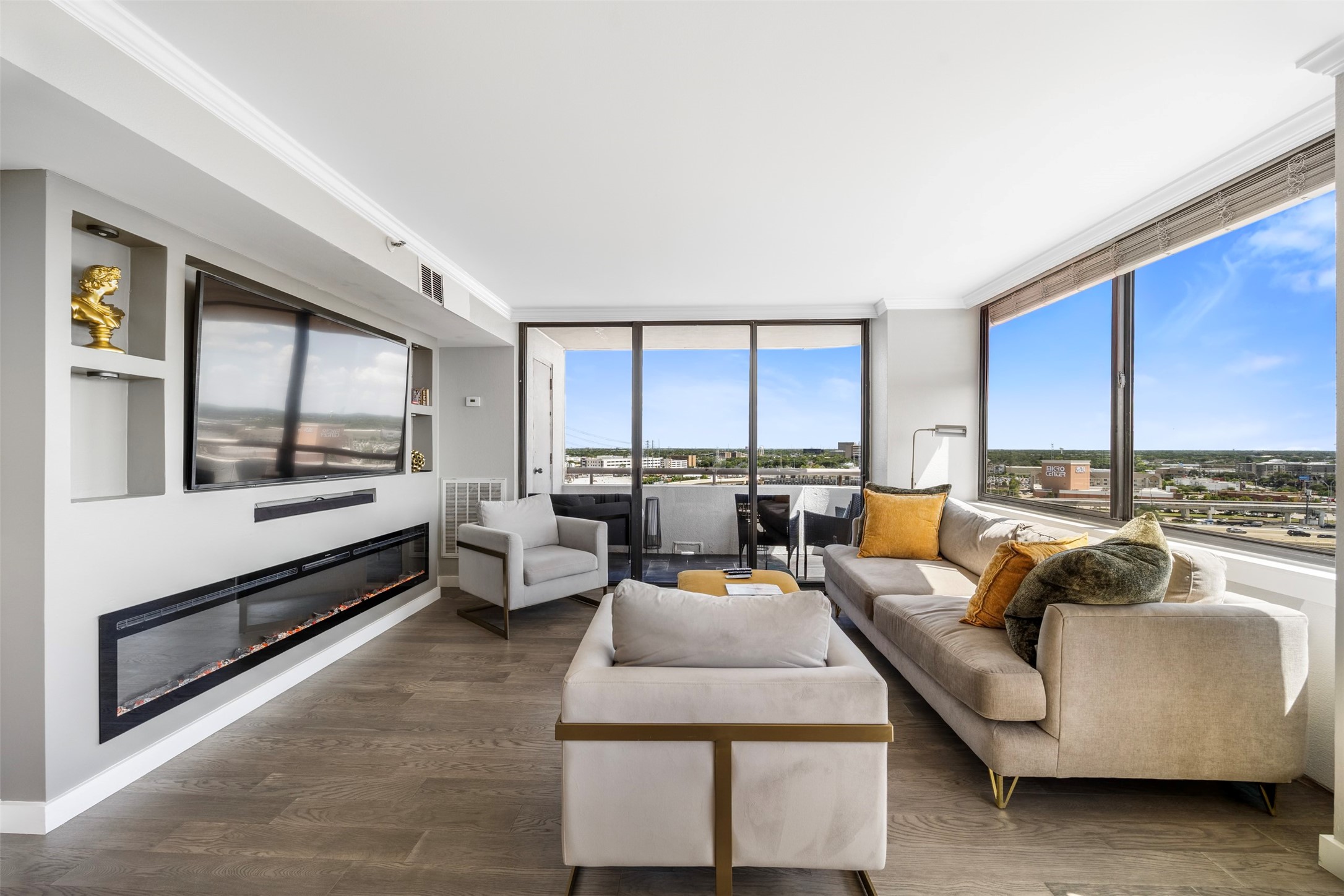 3525 Sage Road, Unit 1403 Houston, TX 77056 - Photo 3 of 47 a living room with furniture and a large window
