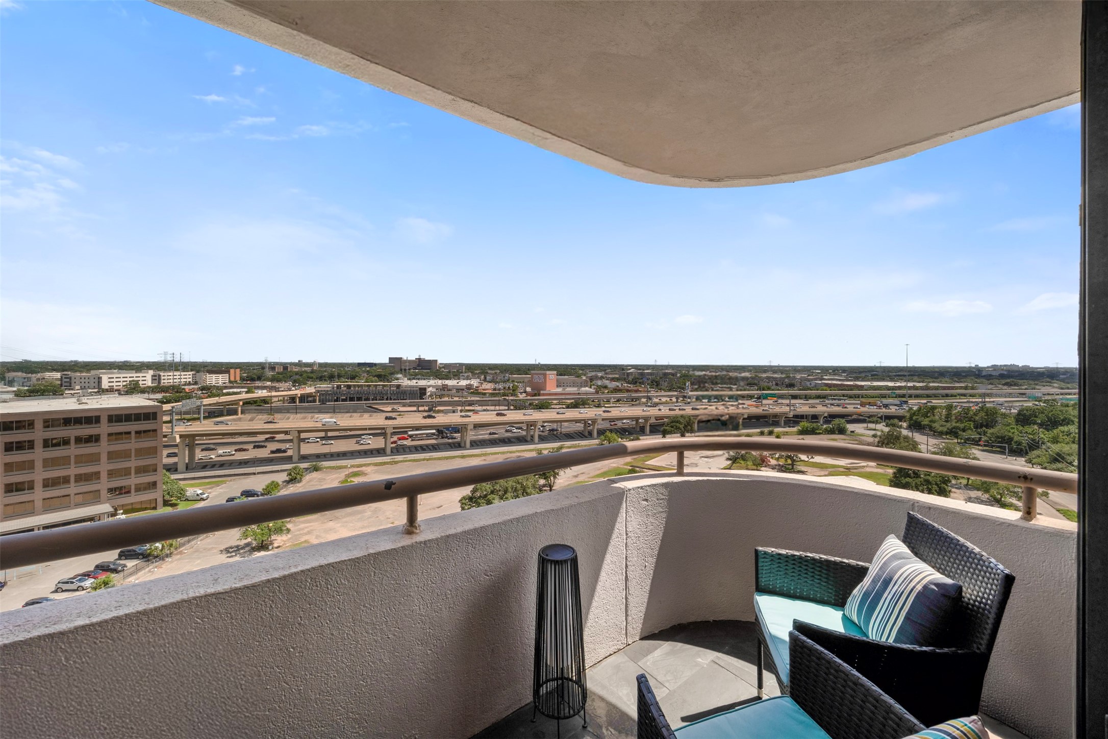3525 Sage Road, Unit 1403 Houston, TX 77056 - Photo 32 of 47 a view of a chairs and an umbrella
