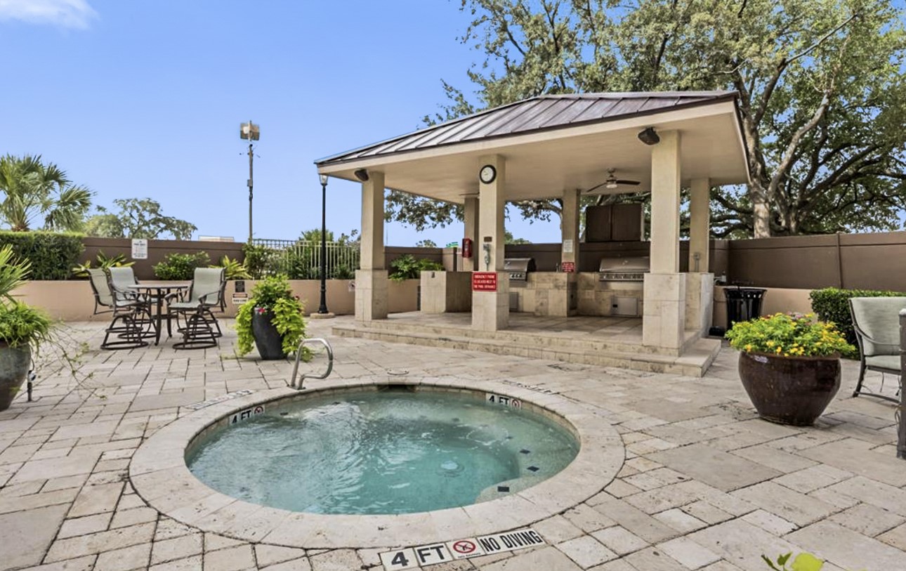 3525 Sage Road, Unit 1403 Houston, TX 77056 - Photo 44 of 47 a view of a swimming pool with outdoor seating