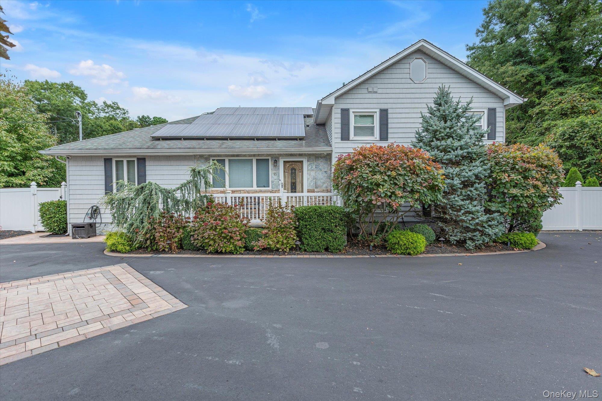 93 Gibbs Pond Road Nesconset, NY 11767 - Photo 1 of 1 front view of house with a yard