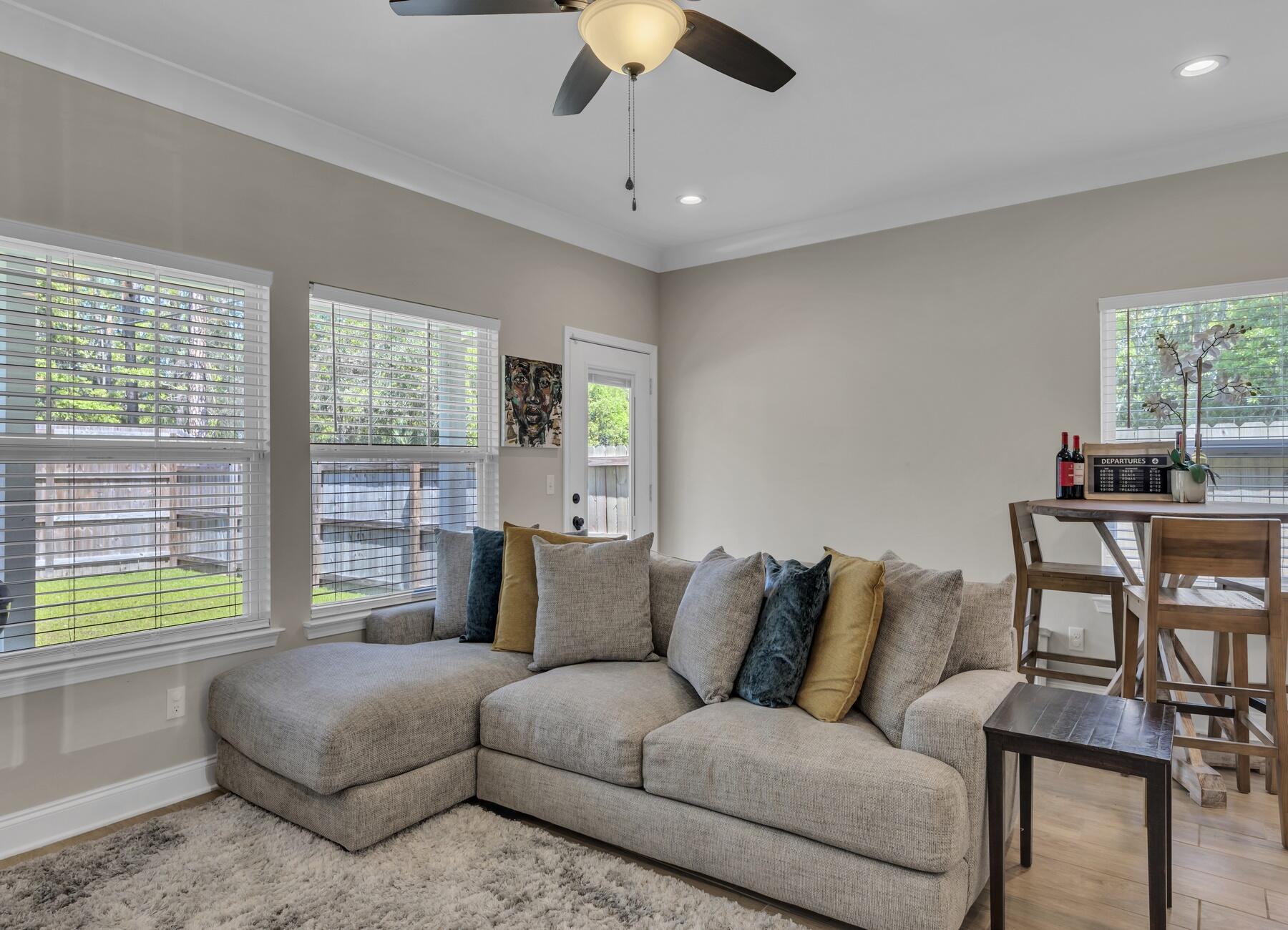 1200 French Quarter Way Fort Walton Beach, FL 32547 - Photo 13 of 45 a living room with furniture and a chandelier