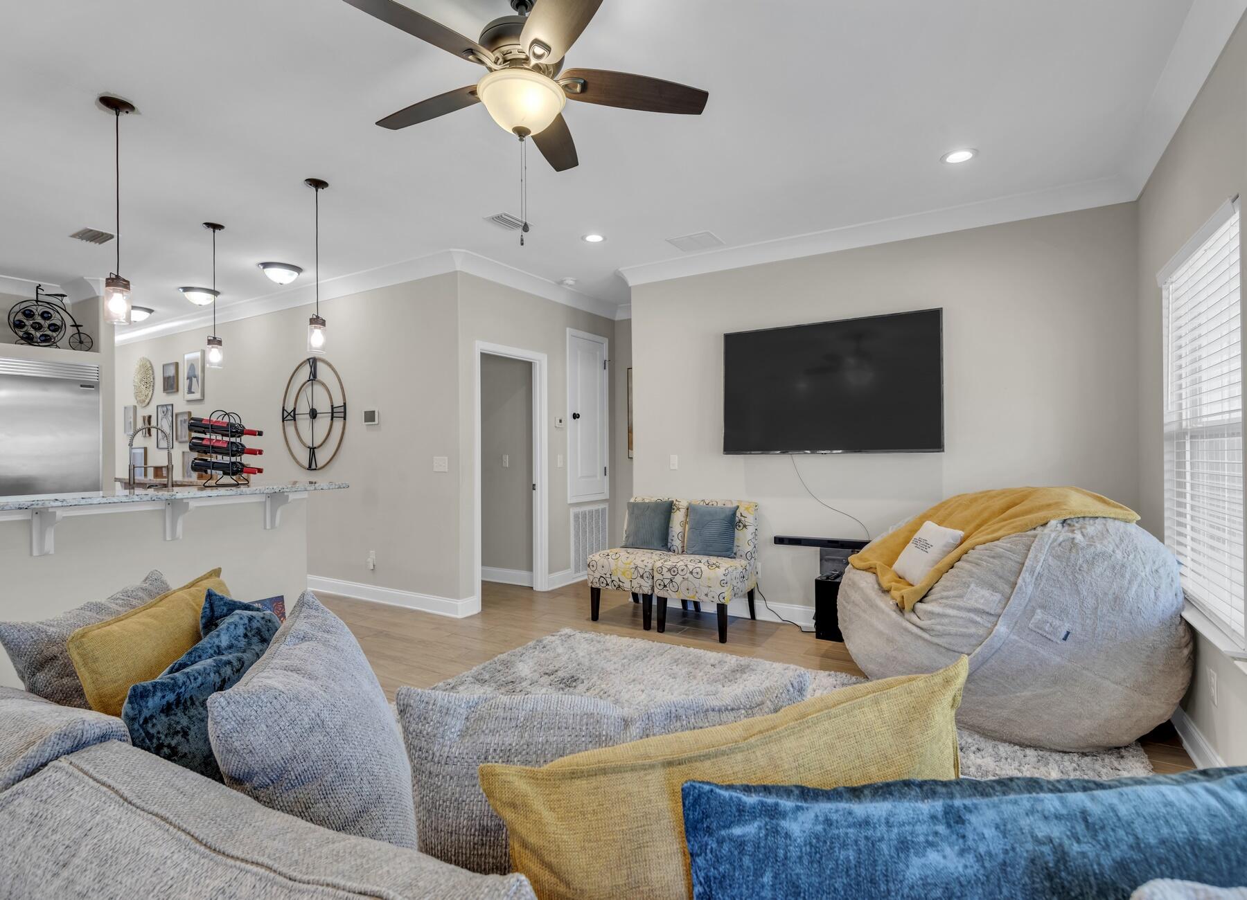 1200 French Quarter Way Fort Walton Beach, FL 32547 - Photo 15 of 45 a living room with furniture and a flat screen tv