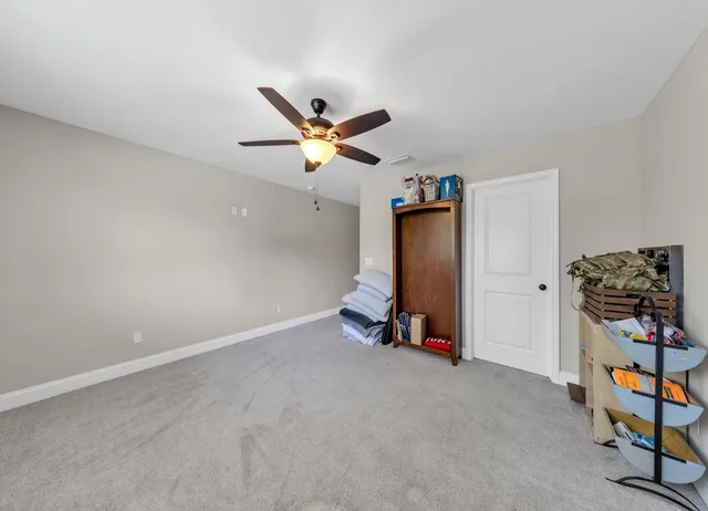 a bed room with a bed and a flat screen tv