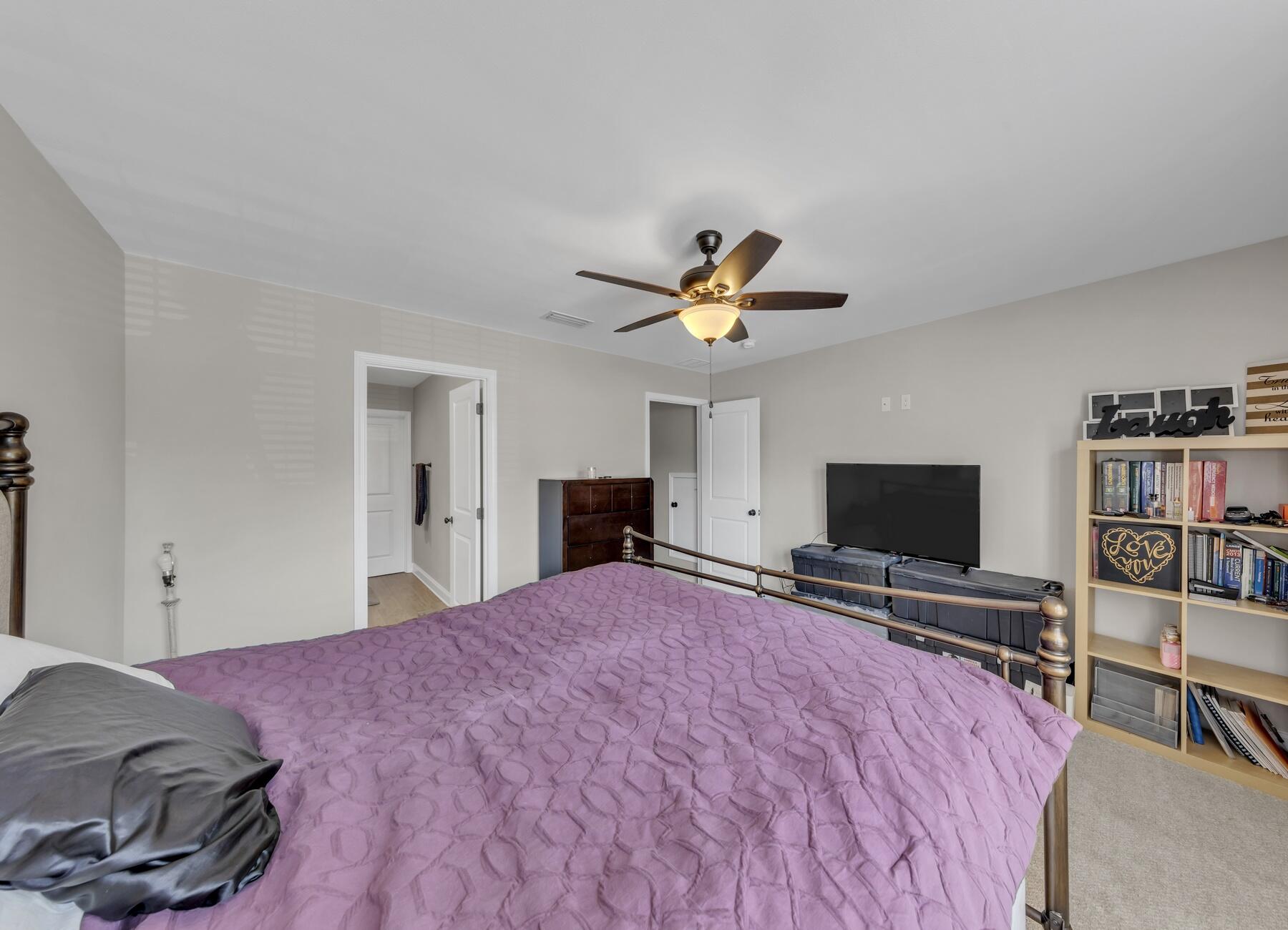 1200 French Quarter Way Fort Walton Beach, FL 32547 - Photo 27 of 45 a bedroom with a bed and a flat screen tv