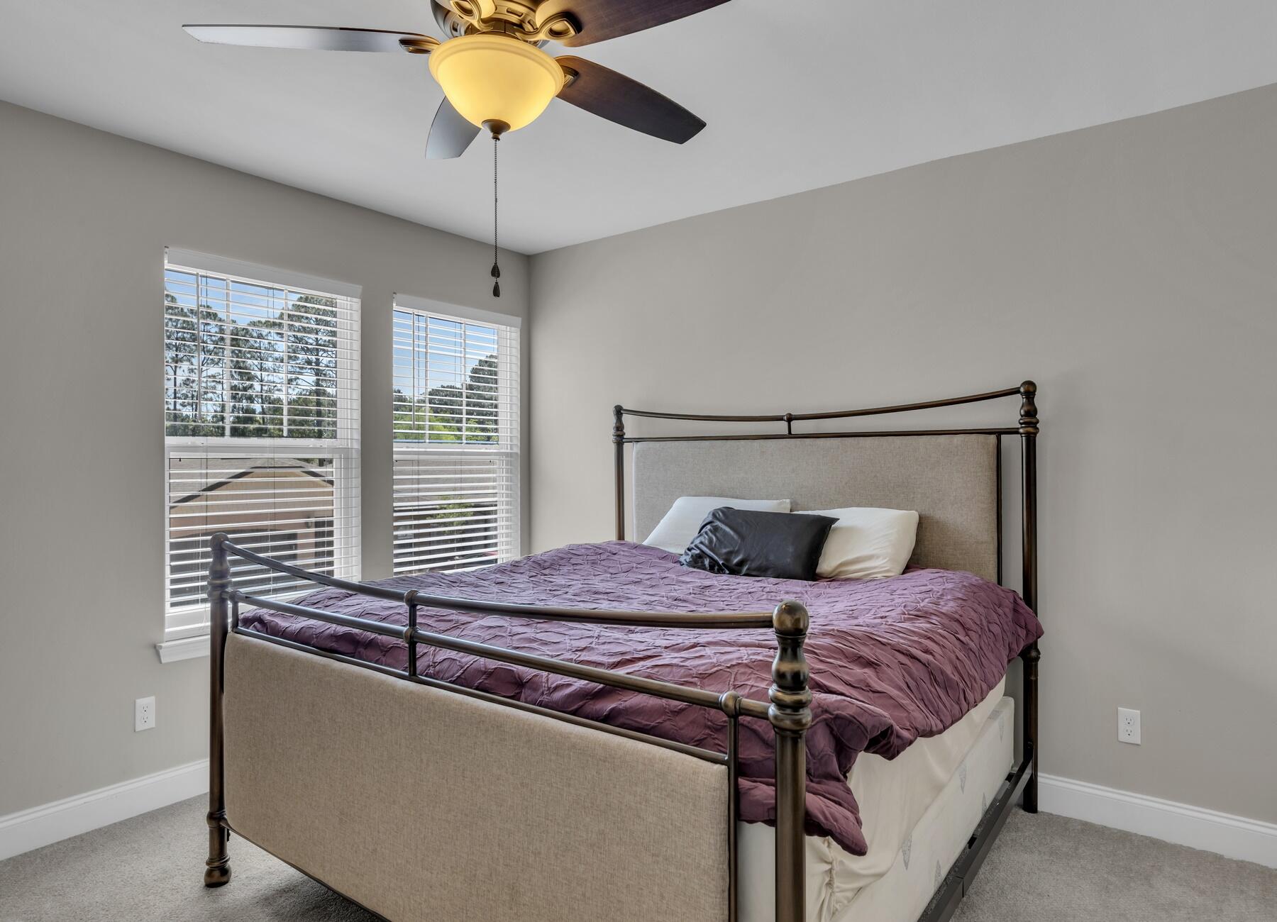 1200 French Quarter Way Fort Walton Beach, FL 32547 - Photo 28 of 45 a bedroom with a bed and a chandelier