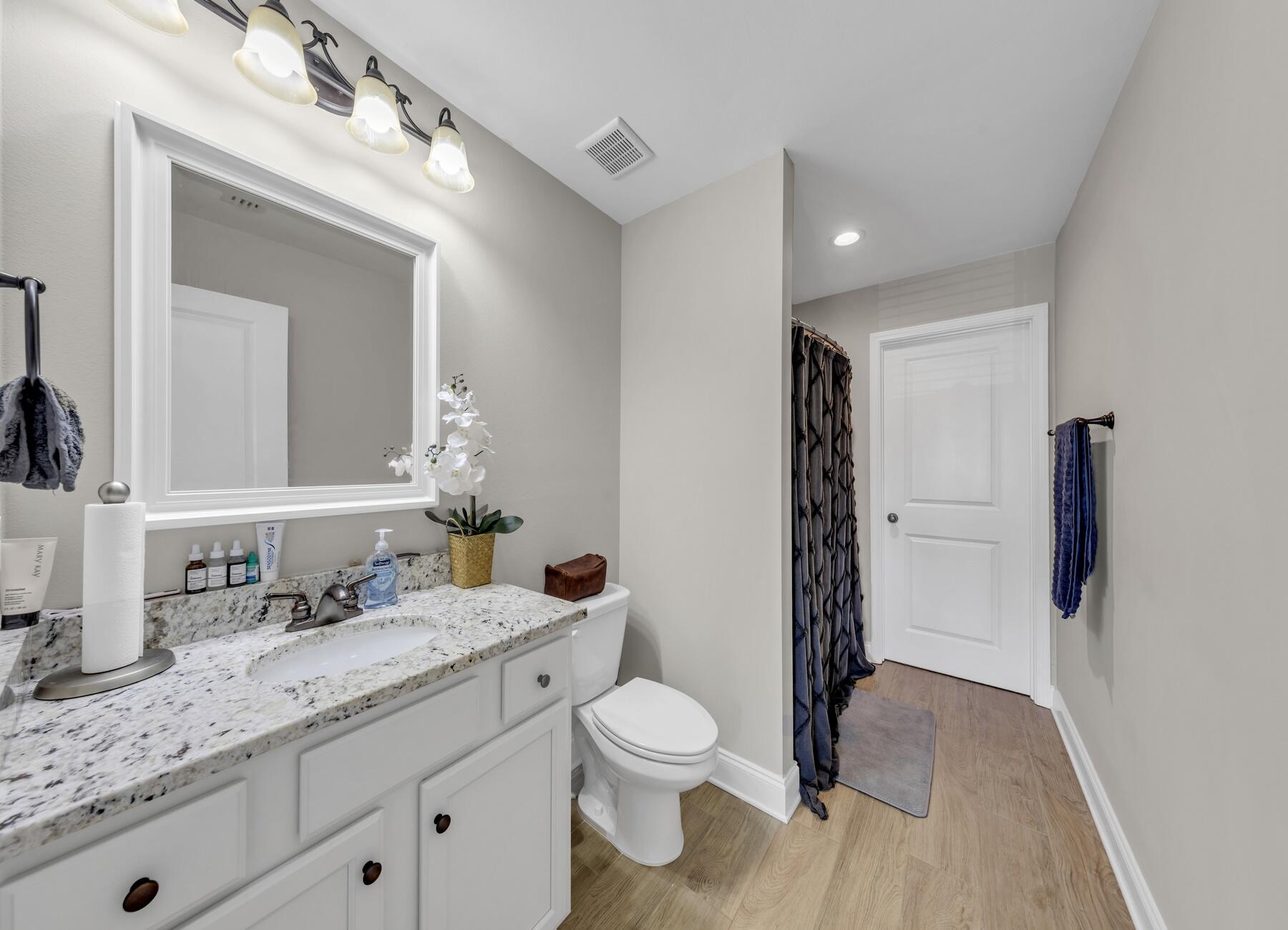 1200 French Quarter Way Fort Walton Beach, FL 32547 - Photo 29 of 45 a bathroom with a granite countertop sink toilet and shower