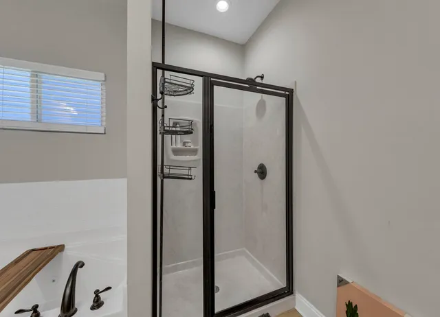 a bathroom with a sink vanity and mirror