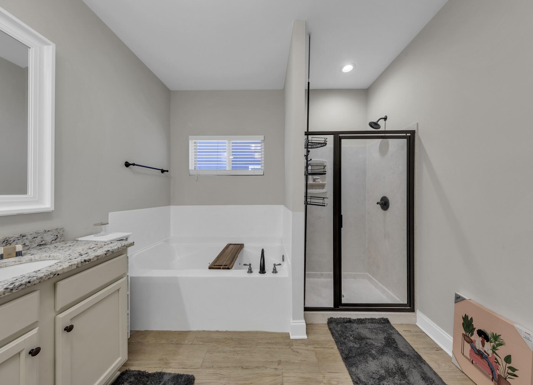 1200 French Quarter Way Fort Walton Beach, FL 32547 - Photo 36 of 45 a bathroom with a tub sink shower and mirror