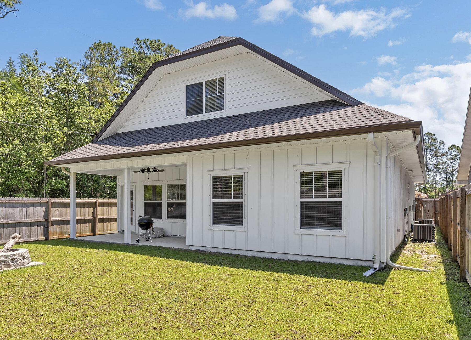 1200 French Quarter Way Fort Walton Beach, FL 32547 - Photo 38 of 45 a view of a house with pool and sitting area