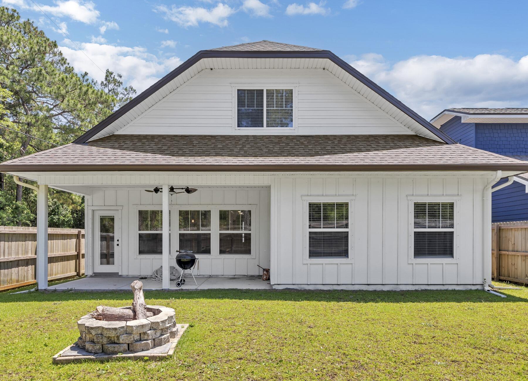 1200 French Quarter Way Fort Walton Beach, FL 32547 - Photo 39 of 45 a swimming pool with outdoor seating and yard