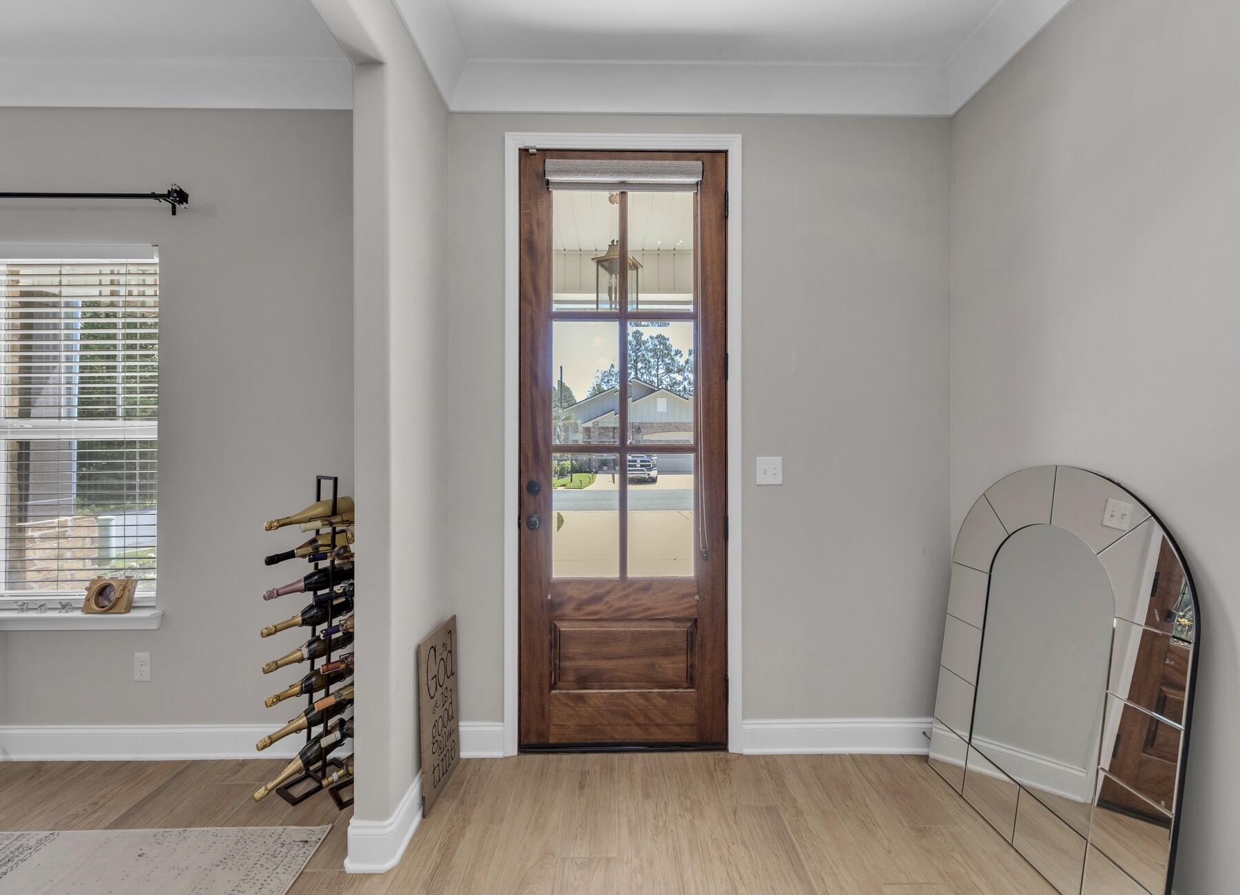 1200 French Quarter Way Fort Walton Beach, FL 32547 - Photo 4 of 45 wooden floor in an empty room with a window