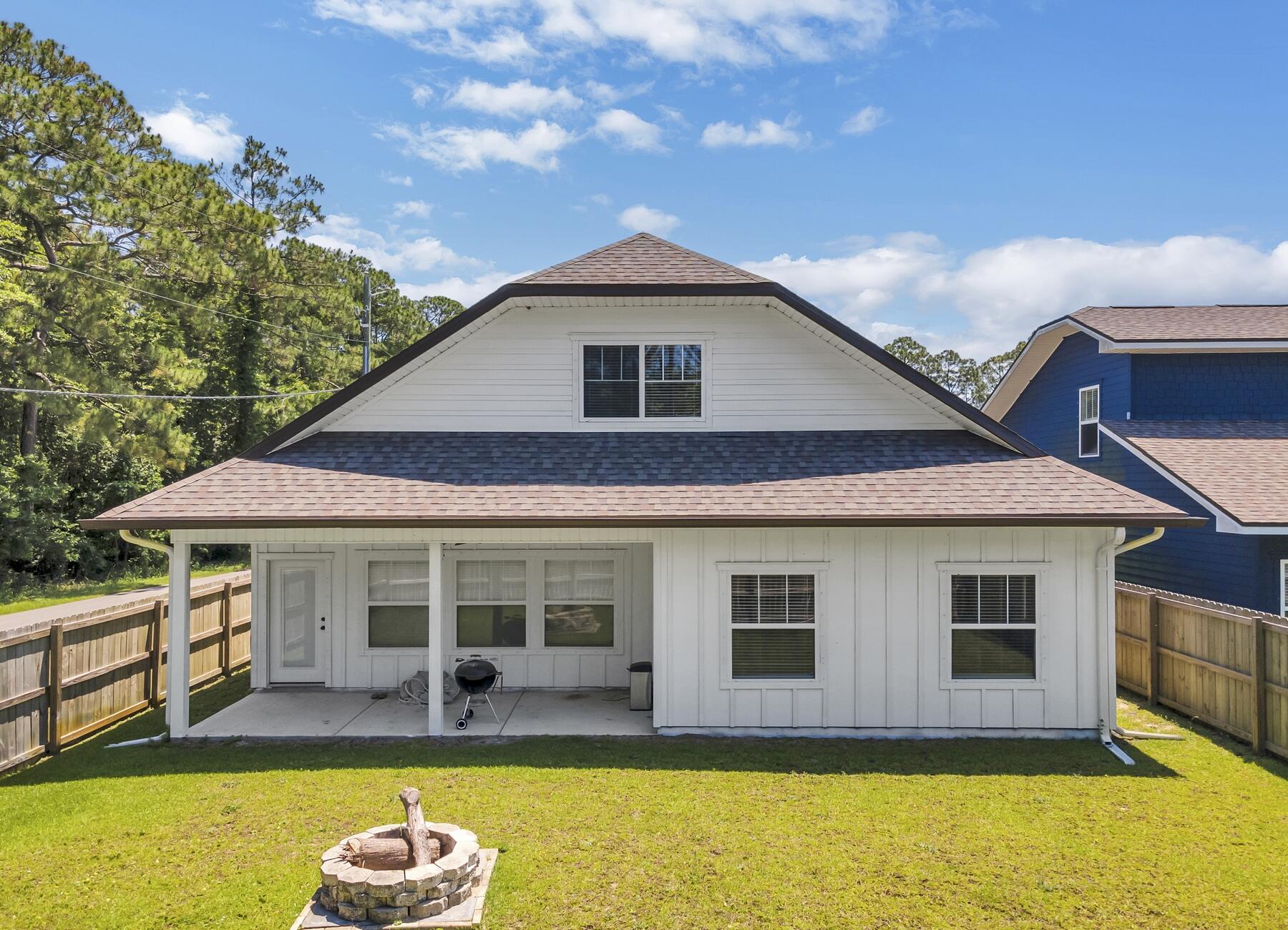 1200 French Quarter Way Fort Walton Beach, FL 32547 - Photo 42 of 45 a front view of a house with swimming pool