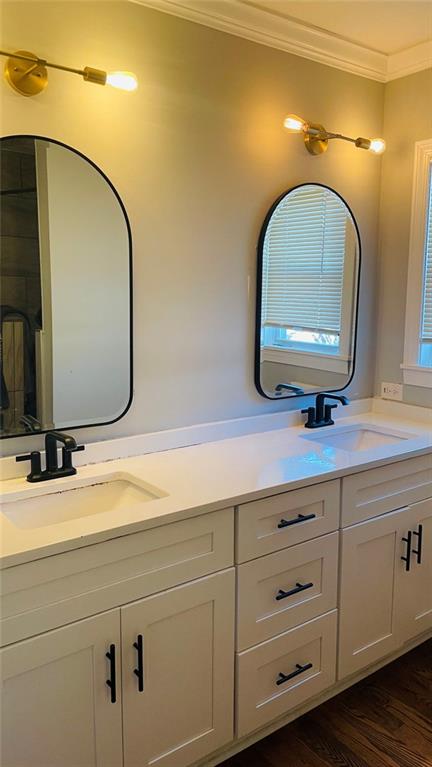 2507 Ryne Street Northwest Atlanta, GA 30318 - Photo 11 of 15 a bathroom with a double vanity sink and a mirror