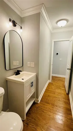 a bathroom with a sink and mirror