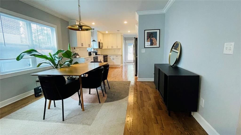 2507 Ryne Street Northwest Atlanta, GA 30318 - Photo 5 of 15 a dining room with furniture and window
