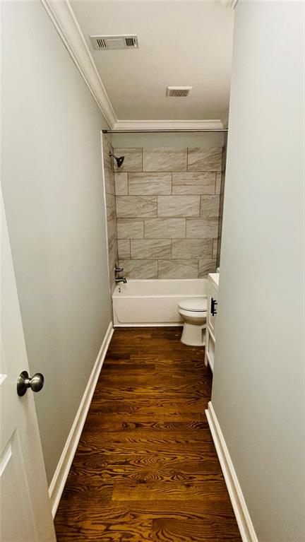 2507 Ryne Street Northwest Atlanta, GA 30318 - Photo 9 of 15 a bathroom with a toilet and shower