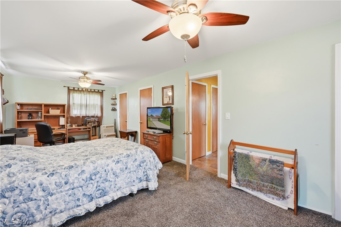 3898 New Road Austintown, OH 44515 - Photo 21 of 45 1st floor primary bedroom (use to be 2 bedrooms- potential to convert back for 5th bedroom option)