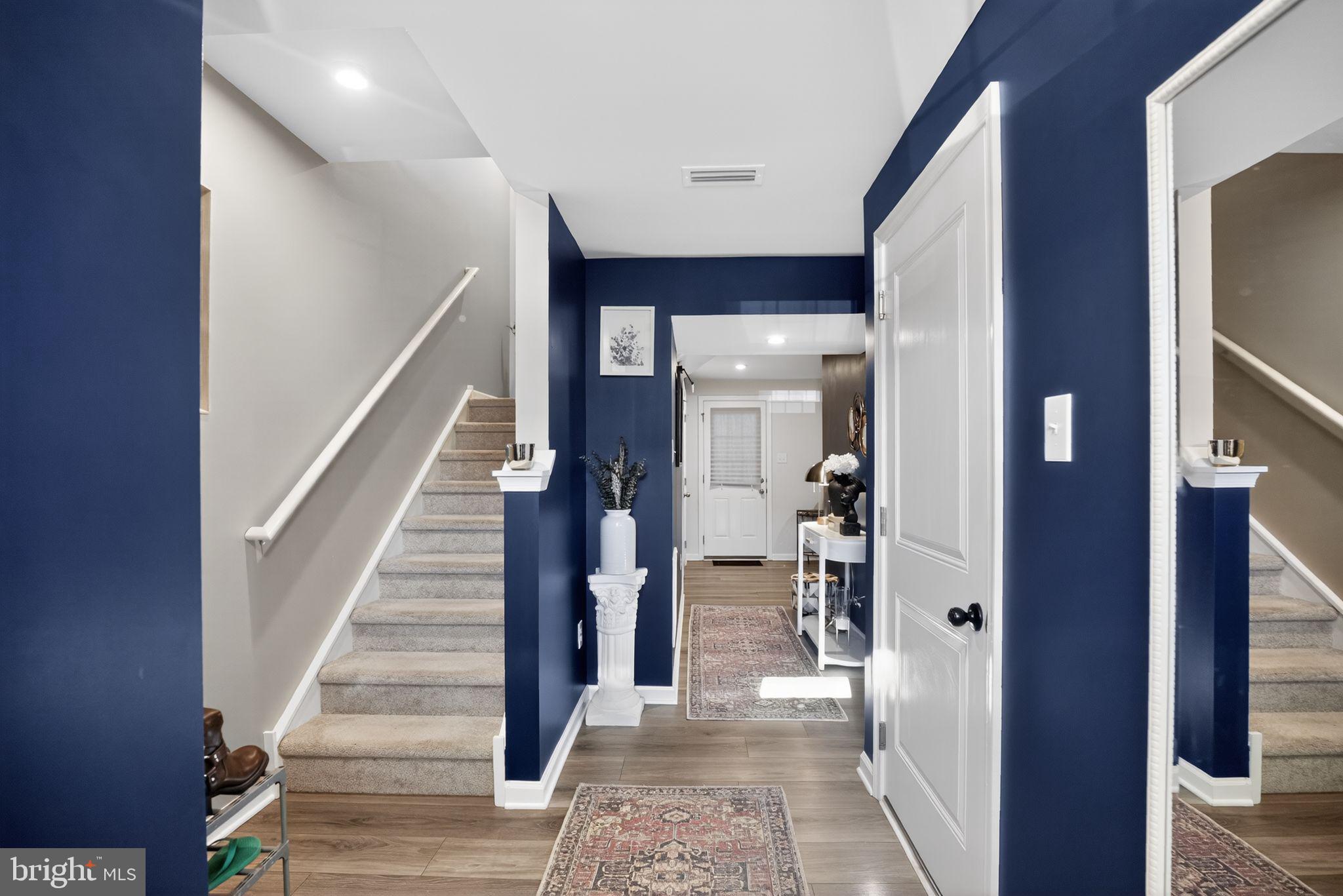 37 Riley Street Williamstown, NJ 08094 - Photo 2 of 15 a view of a hallway with wooden floor and entryway