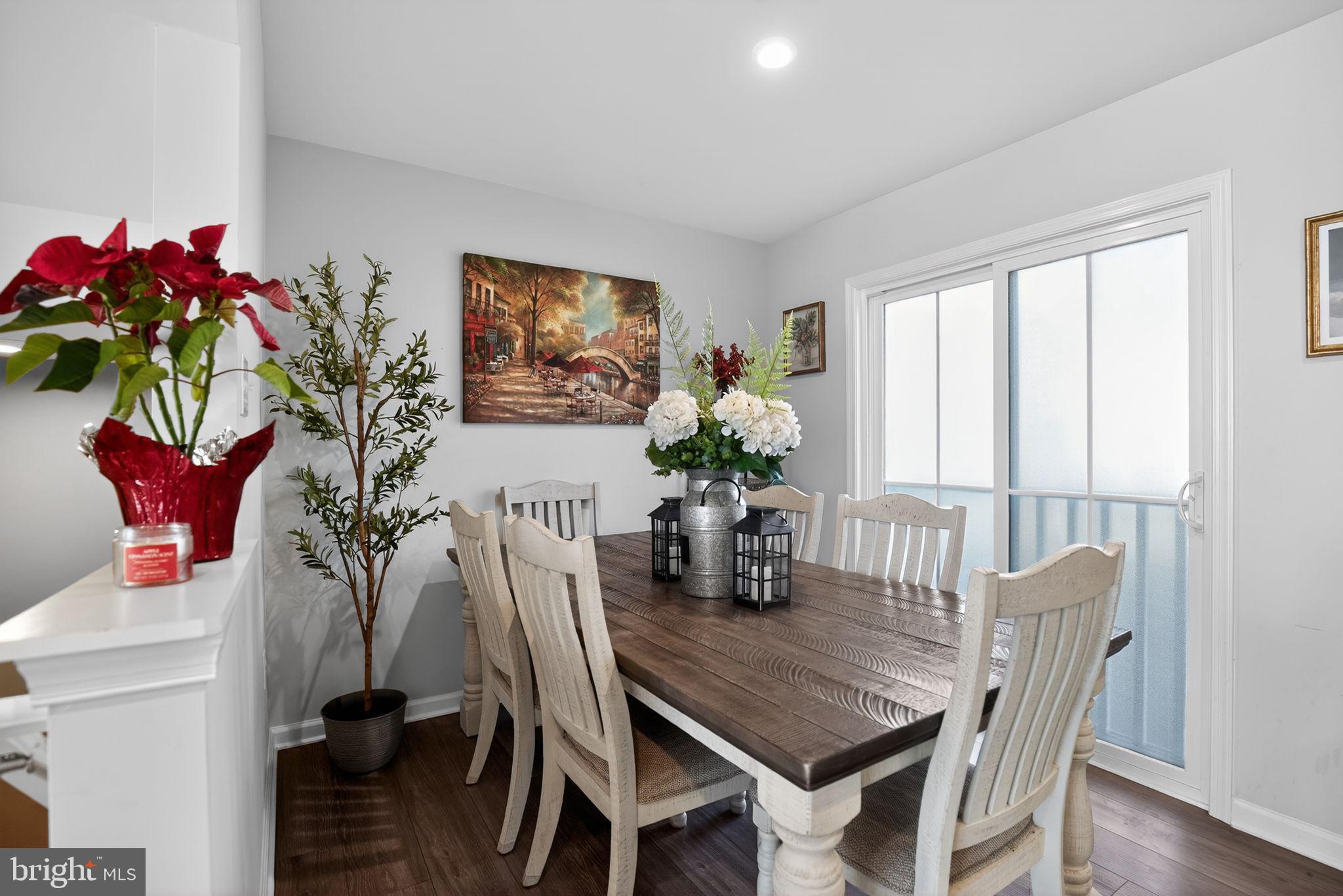 37 Riley Street Williamstown, NJ 08094 - Photo 7 of 15 a dining room with furniture potted plants and wooden floor