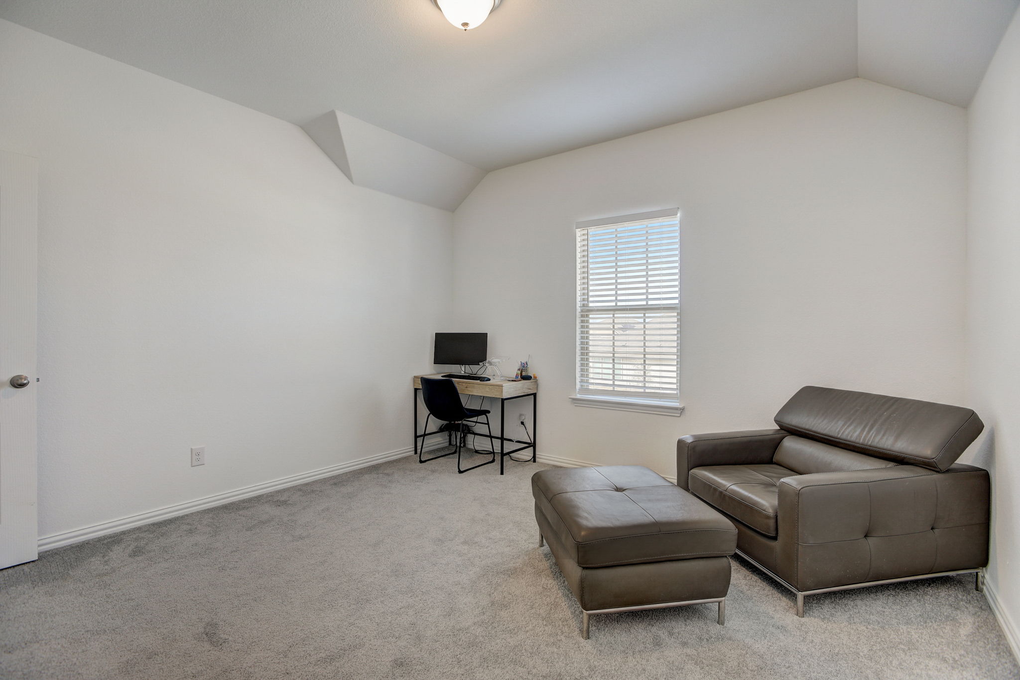 308 Monteforte Road Hutto, TX 78634 - Photo 19 of 32 a living room with furniture and a window