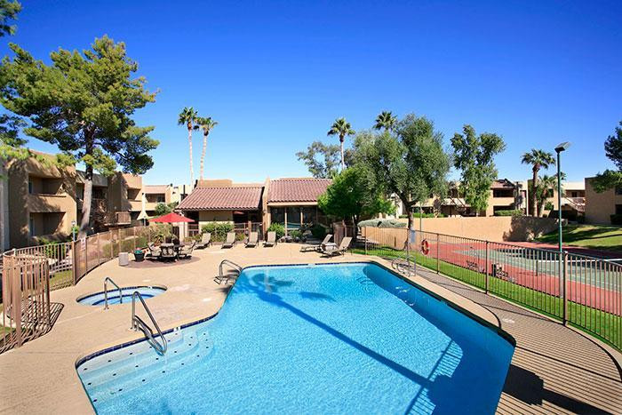 5877 North Granite Reef Road Scottsdale, AZ 85250 - Photo 7 of 10 a view of a swimming pool with lounge chairs