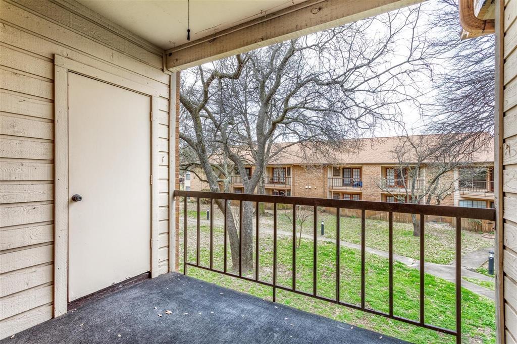 16301 Ledgemont Lane, Unit 283 Addison, TX 75001 - Photo 14 of 16 Balcony overlooks greenspace and has a storage closet available for use.
