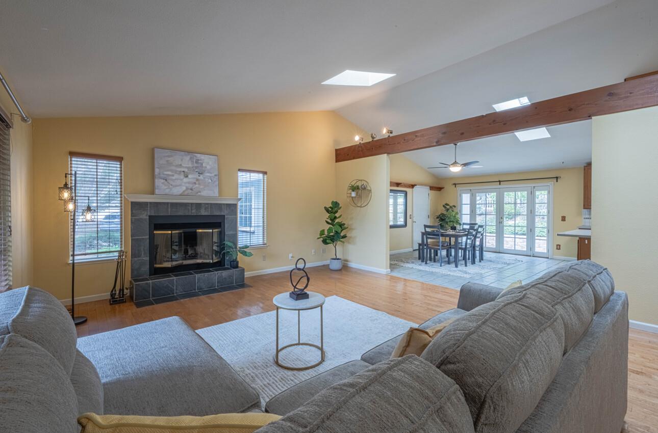 18191 Berta Canyon Road Salinas, CA 93907 - Photo 12 of 36 a living room with furniture and a fireplace