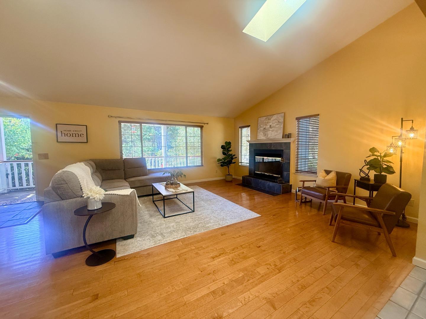 18191 Berta Canyon Road Salinas, CA 93907 - Photo 13 of 36 a living room with furniture and a fireplace