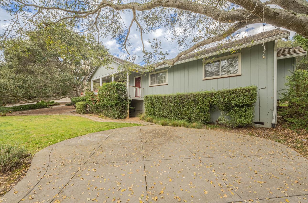 18191 Berta Canyon Road Salinas, CA 93907 - Photo 2 of 36 a front view of a house with garden