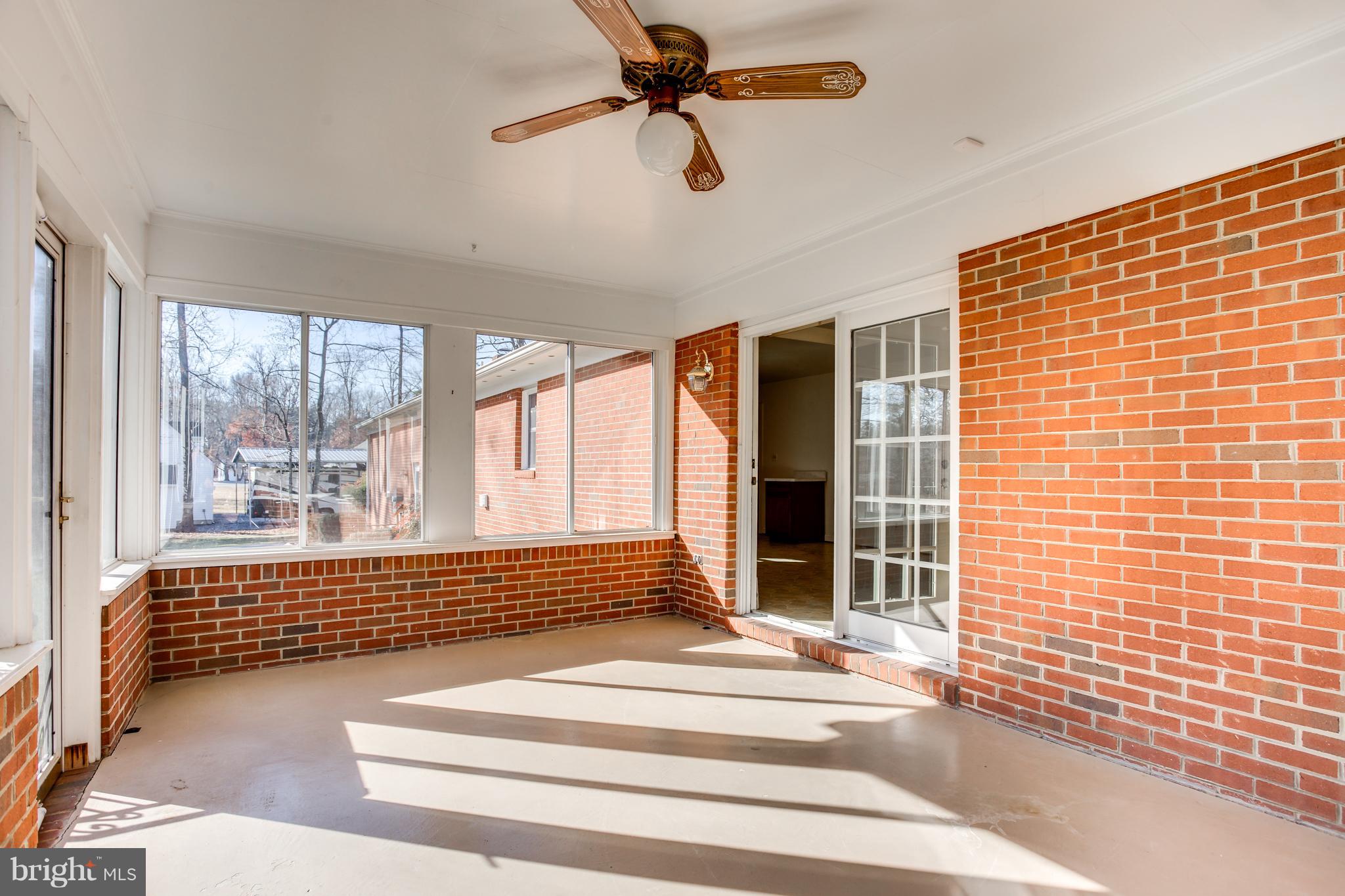 4950 Lansdowne Road Fredericksburg, VA 22408 - Photo 15 of 29 Sunroom beside family room