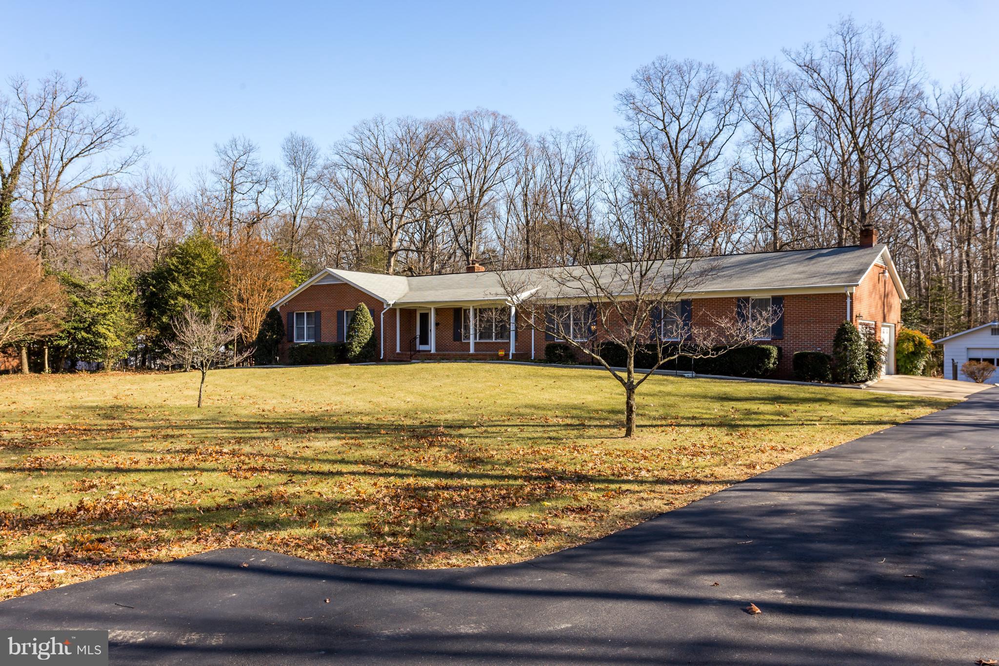 4950 Lansdowne Road Fredericksburg, VA 22408 - Photo 2 of 29 Lots of off-street parking on paved driveway.