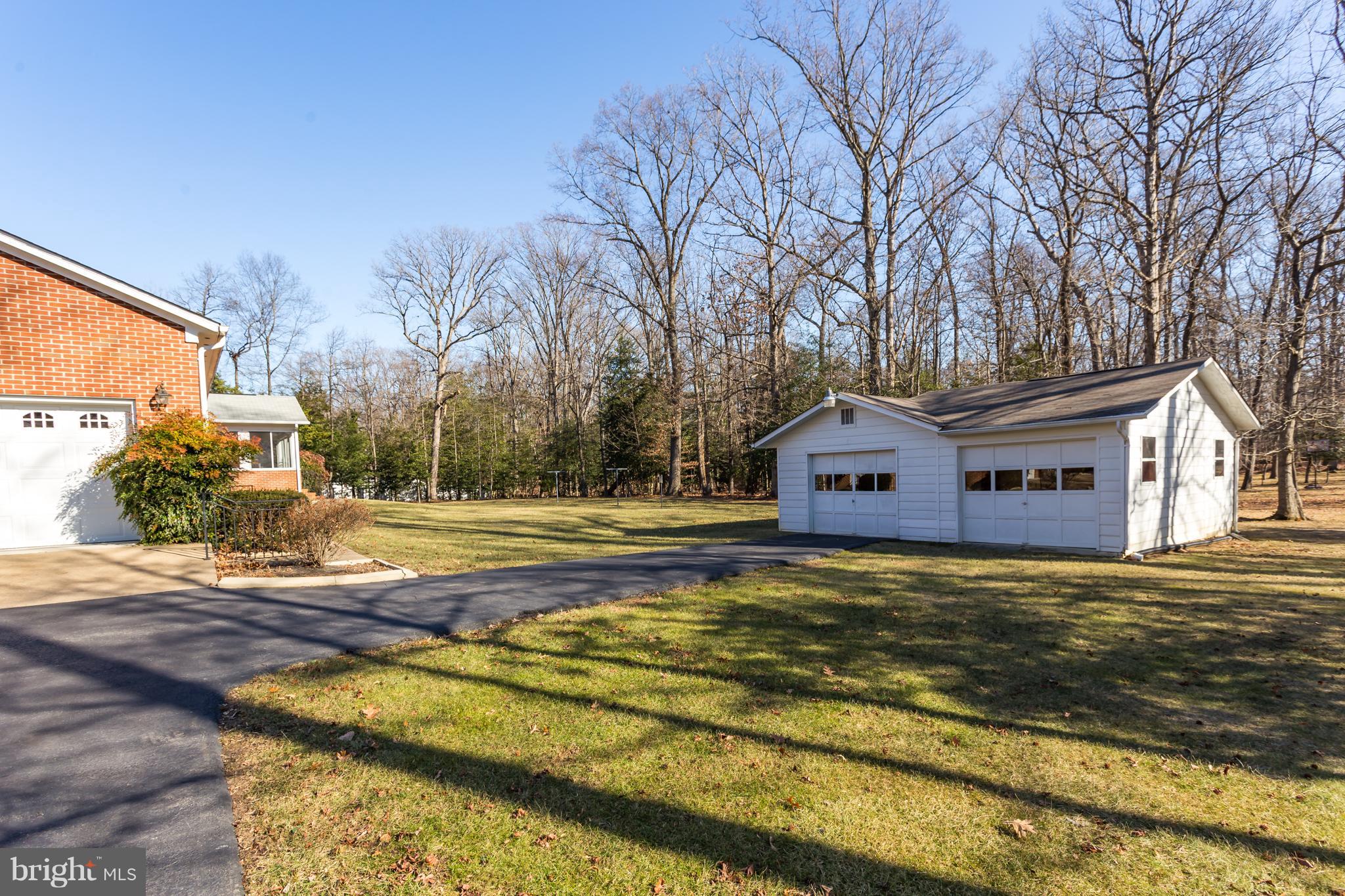 4950 Lansdowne Road Fredericksburg, VA 22408 - Photo 4 of 29 Two garages, four vehicle spaces!