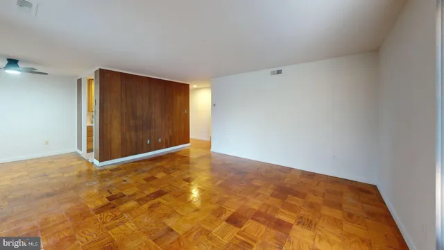 a view of an empty room and window