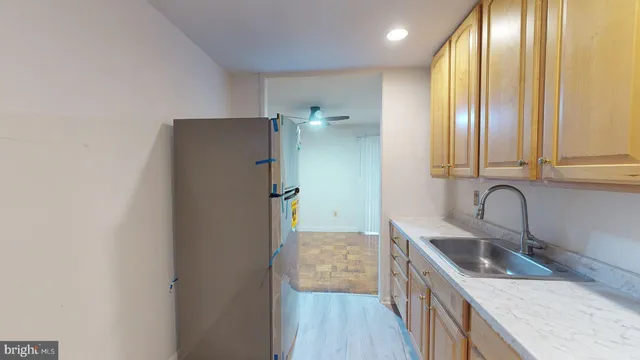 a view of an empty room with glass door