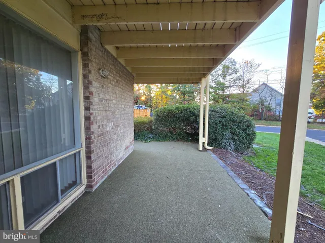 a stove top oven sitting inside of a kitchen