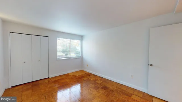 a view of an empty room and window